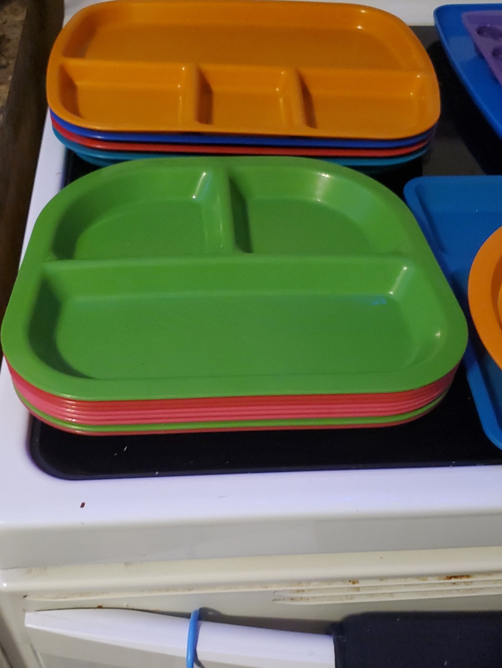 Stack of Colorful Divided Kids Plates - Fun Ice Cube Trays
